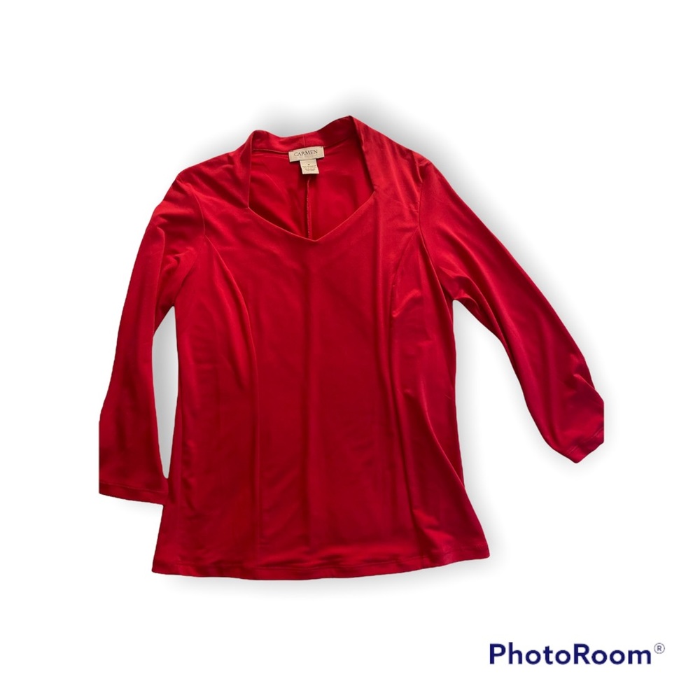 Bright fuchsia long sleeve blouse.